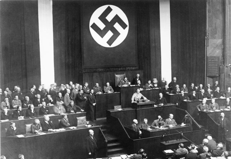 Adolf Hitler declares the Enabling Act at the Reichstag Kroll Opera House, Berlin. The amendment gave him full power to enact laws without the Reichstag, and was the first step to a dictatorship in Germany